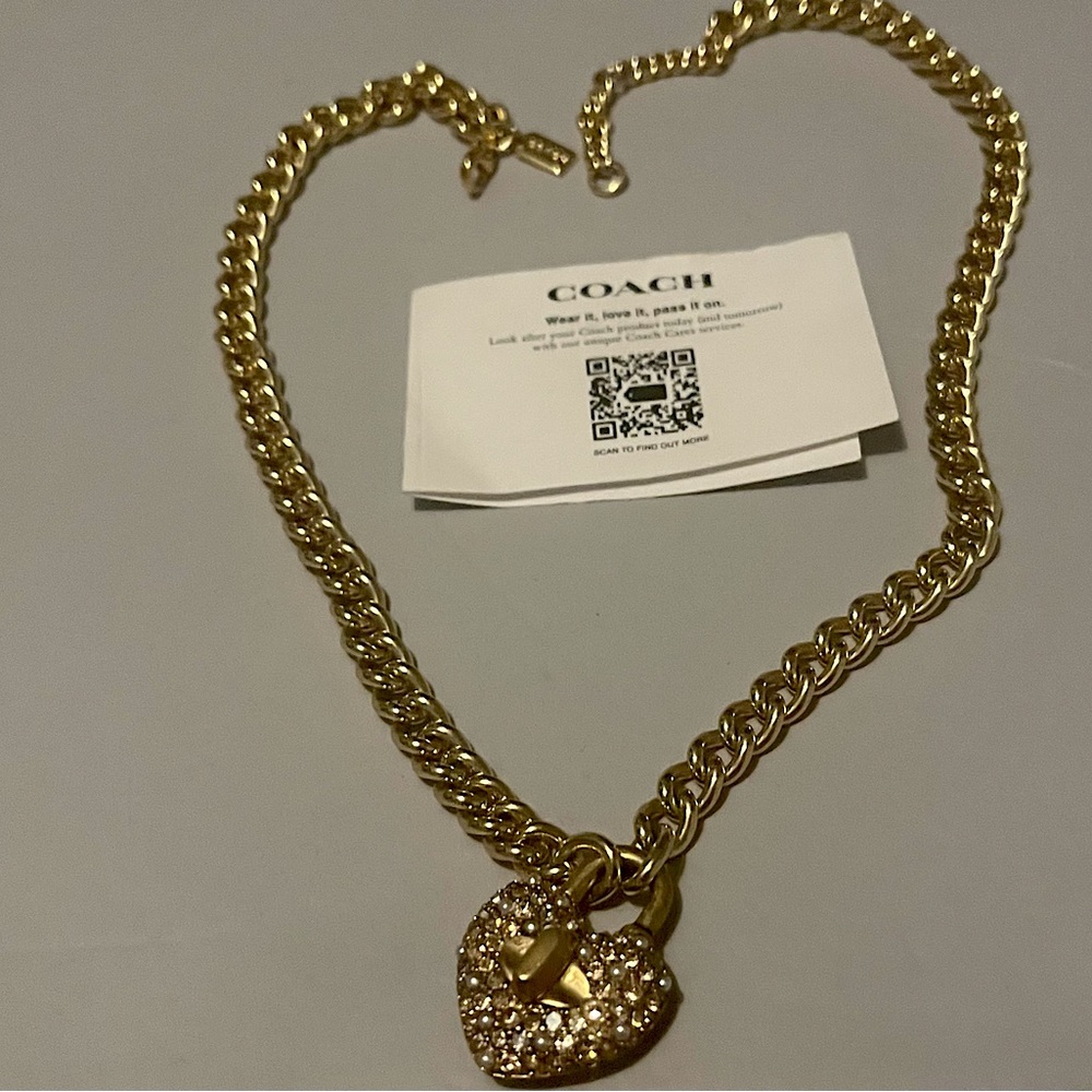 Brand new gold coach necklace